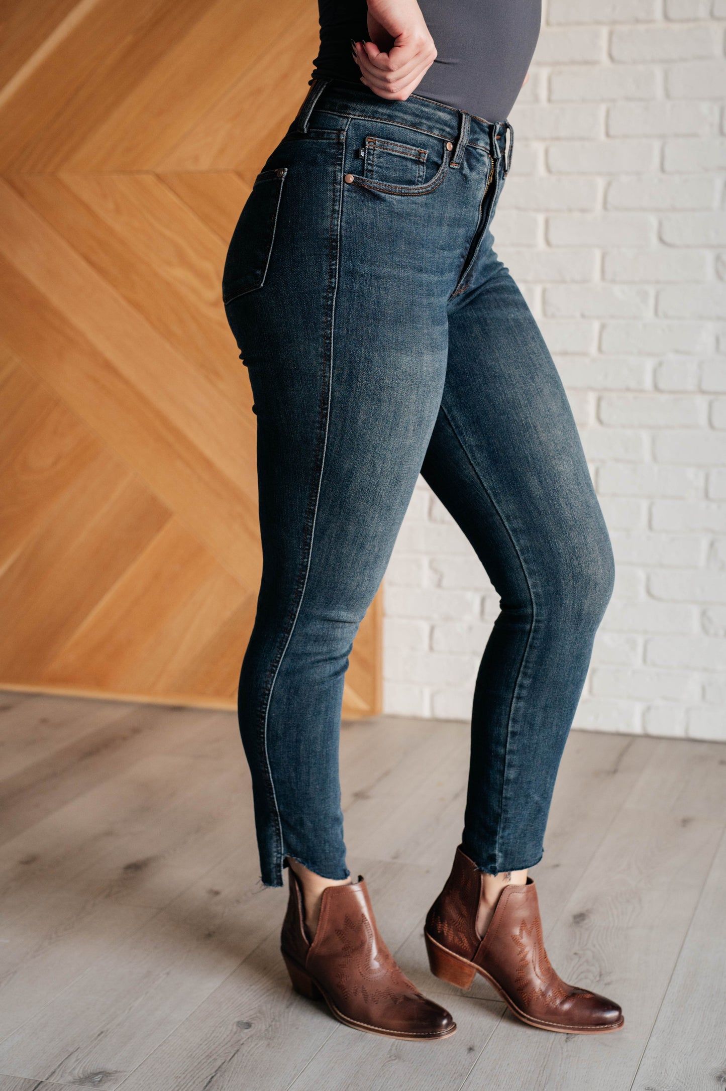 High Rise Control Top Step Hem Skinny Jeans