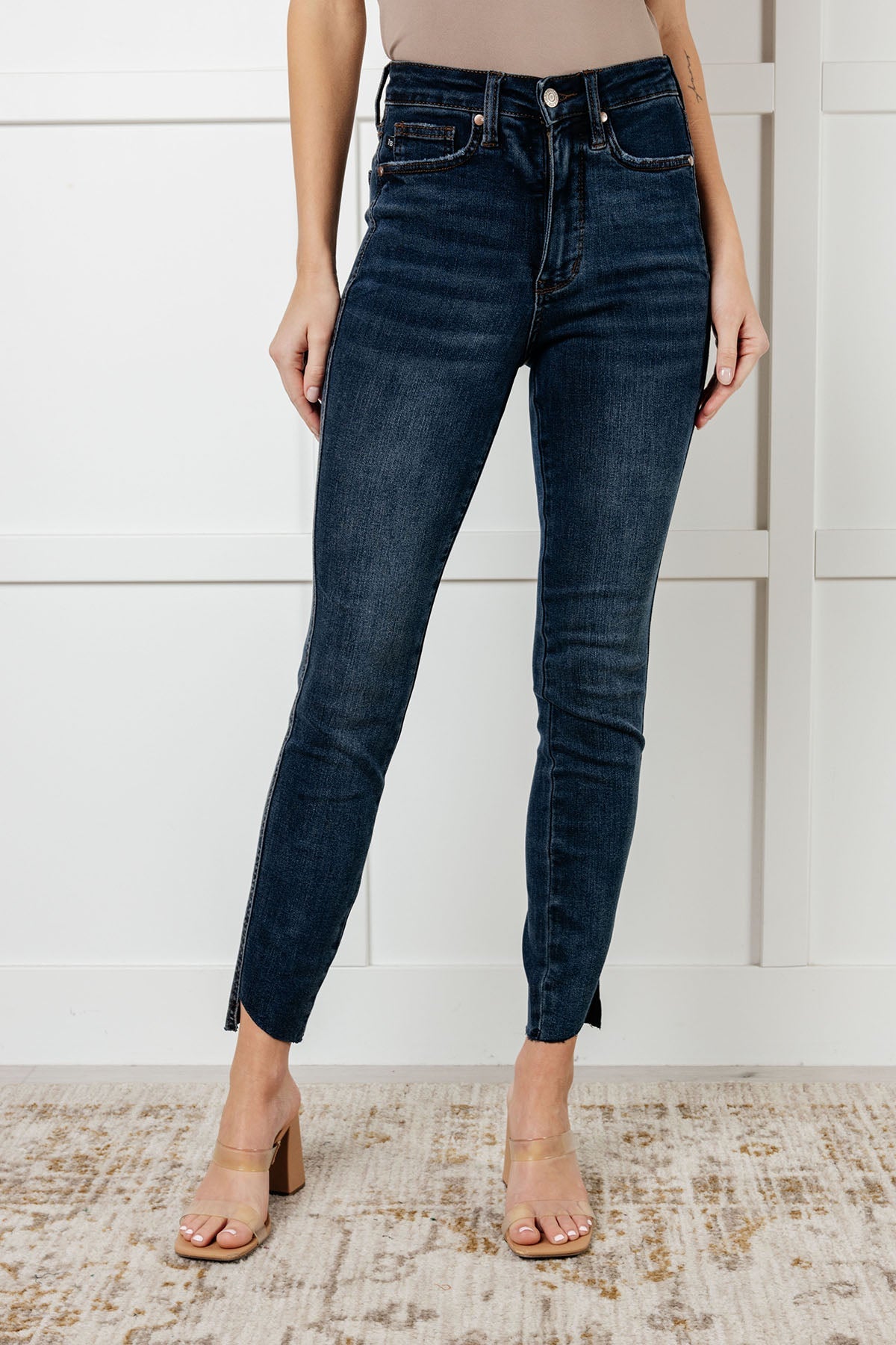 High Rise Control Top Step Hem Skinny Jeans